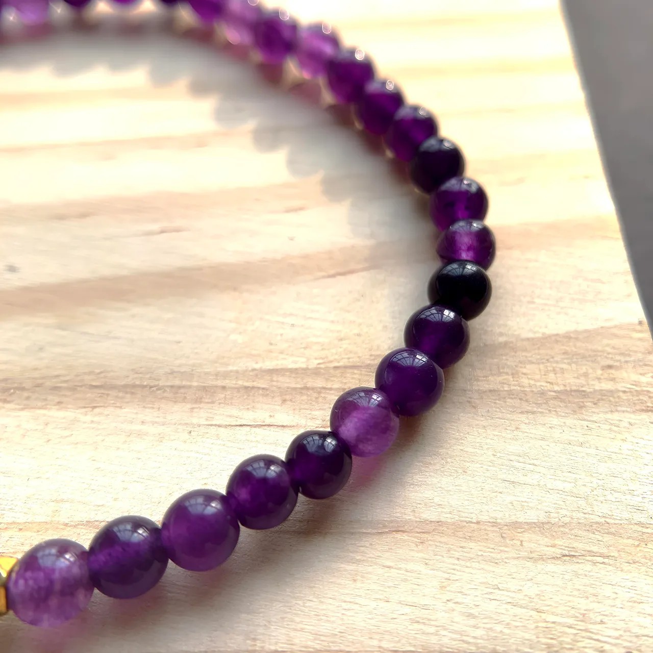 Amethyst Bracelet detail — natural purple tones and polished surface