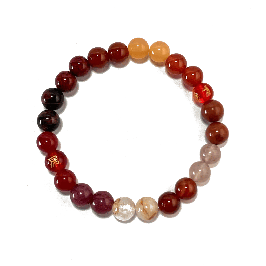 The Fire Element Bracelet in 8mm warm stones, laid on a white background