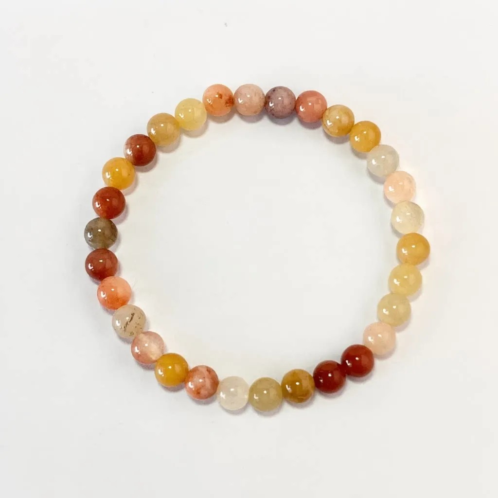 Golden Silk Jade Bracelet in 6mm natural jade beads with golden threads