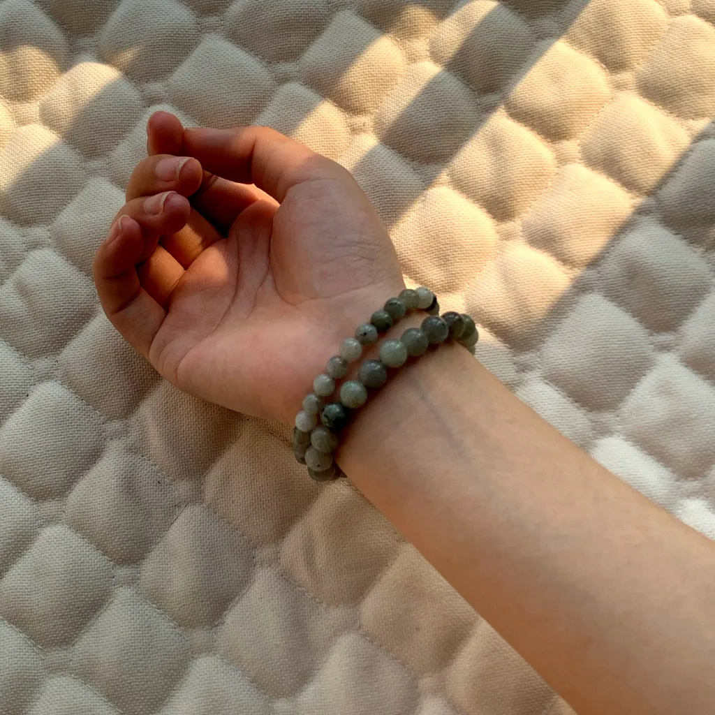 6mm White Flash Stone Bracelet layered with 8mm White Flash Stone Bracelet on the wrist - a stacked everyday styling